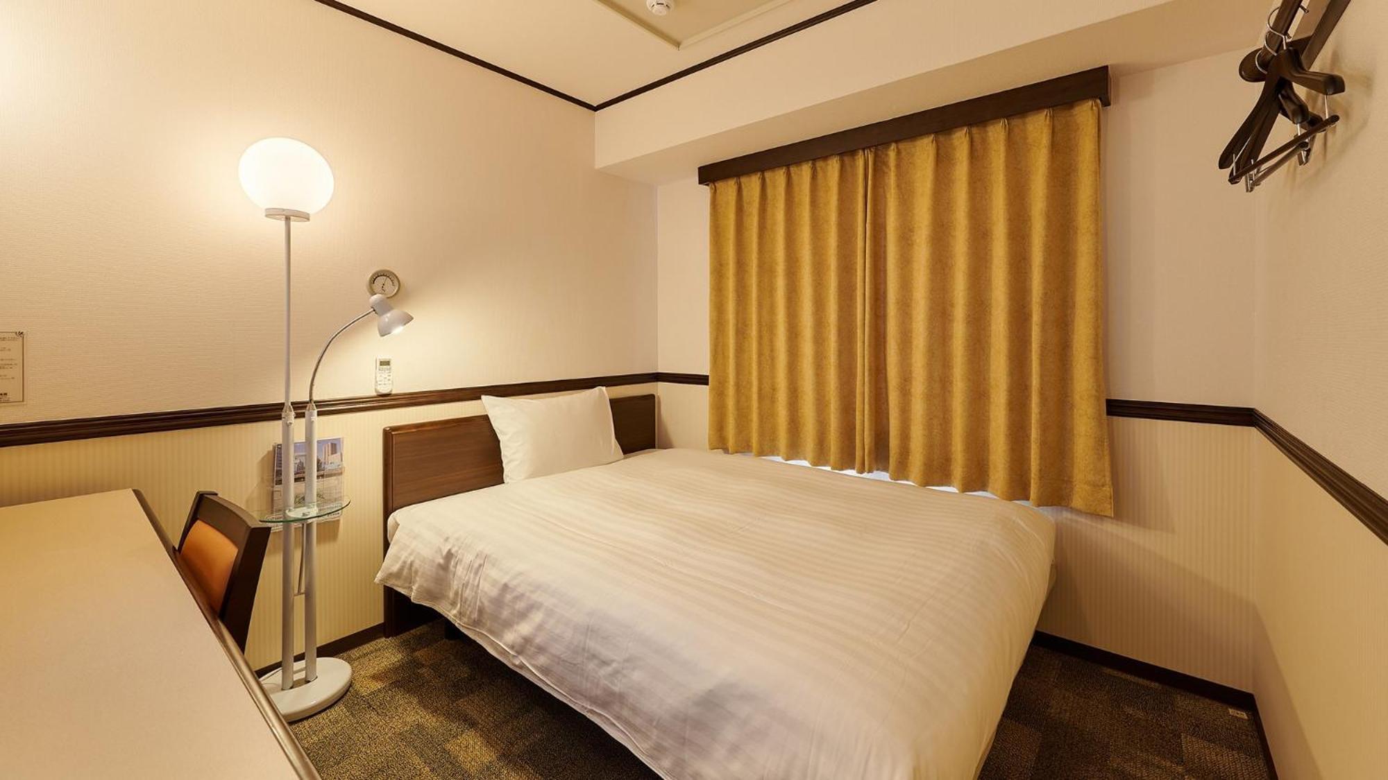 Toyoko Inn Fukuyama-Eki Shinkansen Minami-Guchi Rum bild