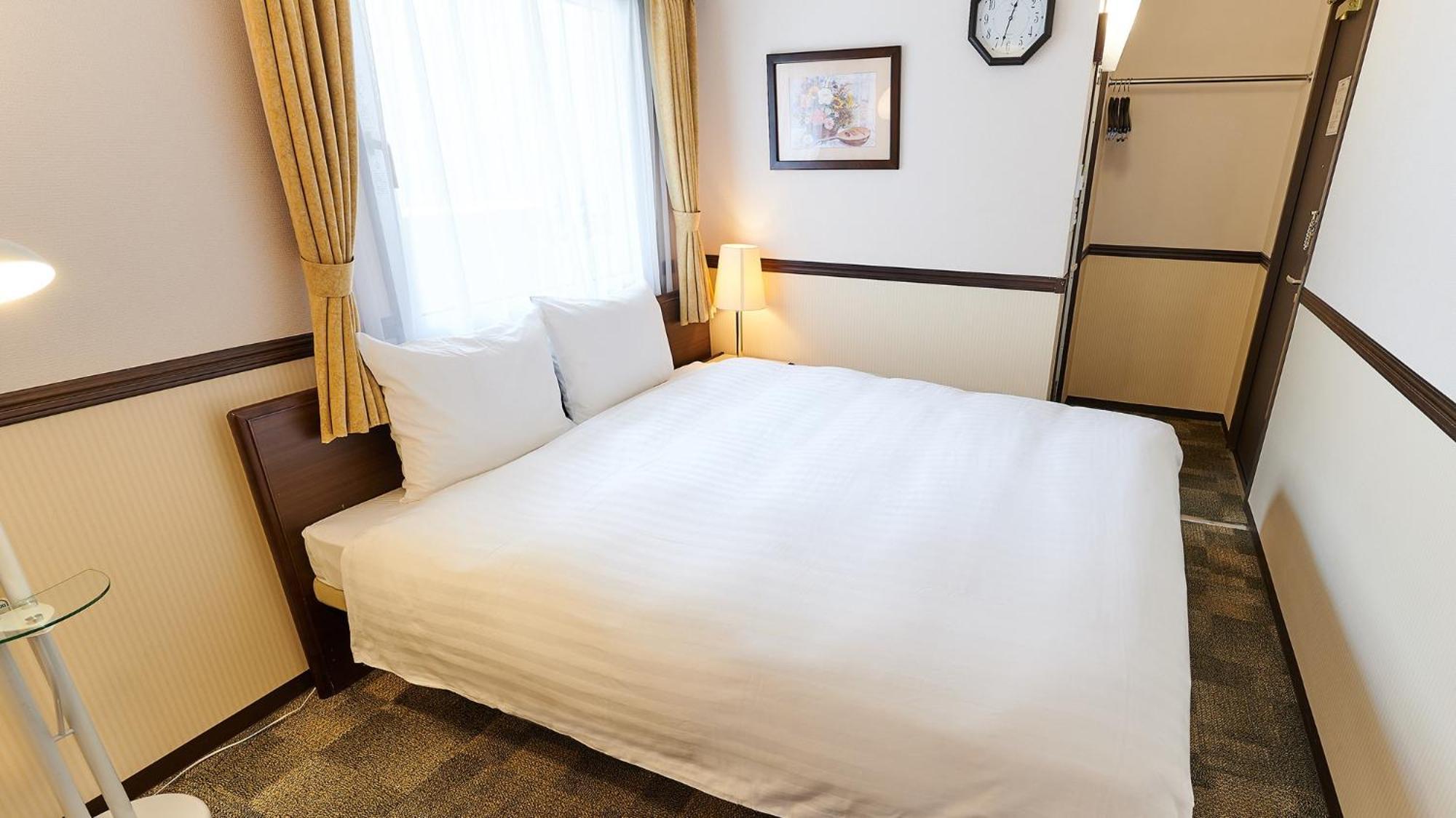 Toyoko Inn Fukuyama-Eki Shinkansen Minami-Guchi Rum bild